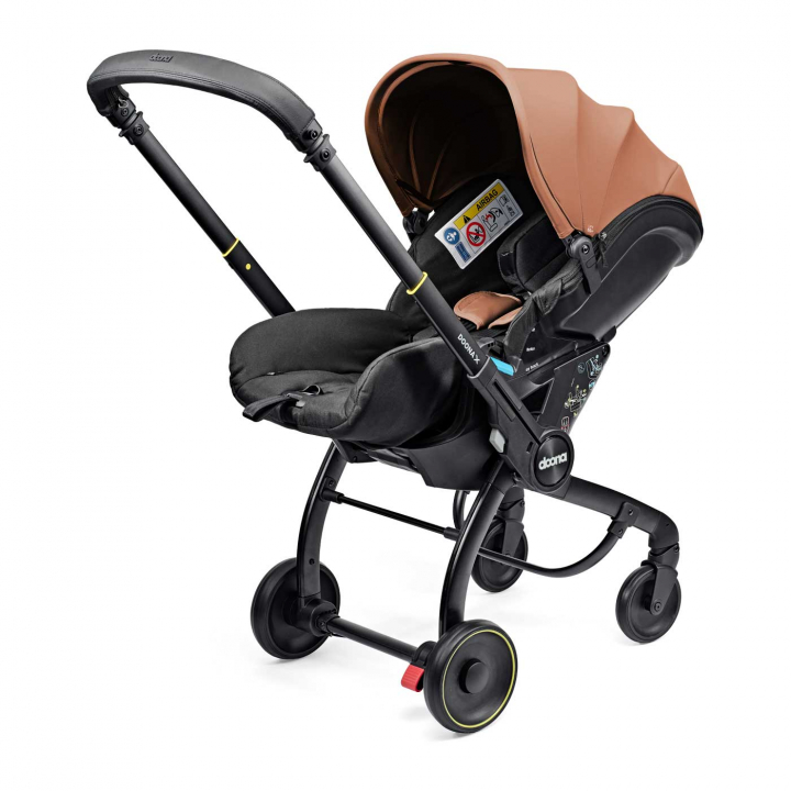 Doona X Babyskydd Terracotta | Bilbarnstolar - Varumärken - Doona | BabyMode